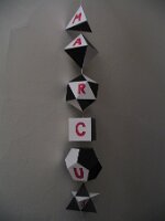 Wall hanging of the five Platonic solids, with stella octangula